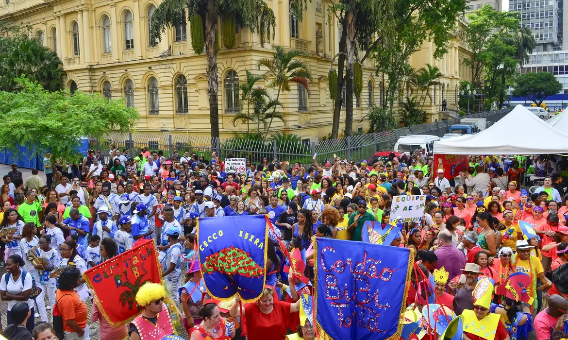 https://s3.us-east-005.backblazeb2.com/inferenciati-hmlg-inferenciacms-media/sites/logo/BlocosdeCarnavalcomMichelTelePocahanimamoIbirapuera.png